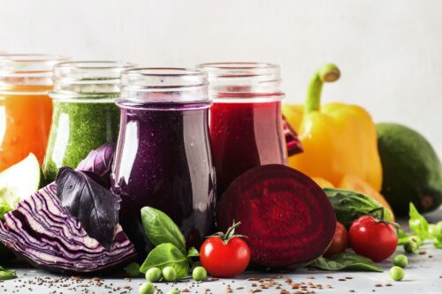 Colorful vegan vegetable juices and smoothies