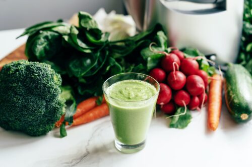 Cooked smoothie on the table in the kitchen. Vegetable nutrition. Healthy lifestyle concept.