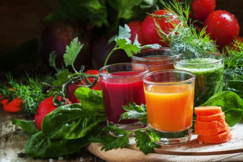 Set of vegetable juice in glasses: beetroot, tomato, spinach, carrots, herbs