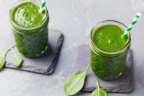 Spinach smoothie Healthy drink in glass jar